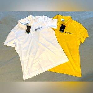 Pair of Nike Dri-Fit women's golf polos.